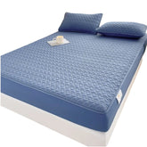 Huitich waterproof king size bedding topper in blue with quilted pattern and matching pillows